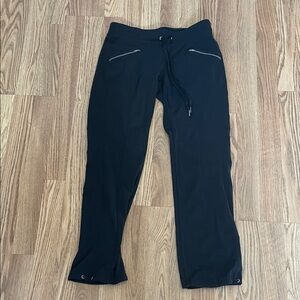 Athleta size small petite, black athletic pants. Very comfortable!